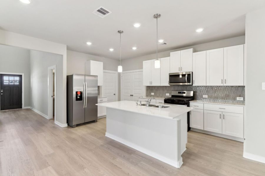 Photo is not of the actual home, but is an inspirational photo of builder’s model home and may depict options, furnishings, and/or decorator features that are not included