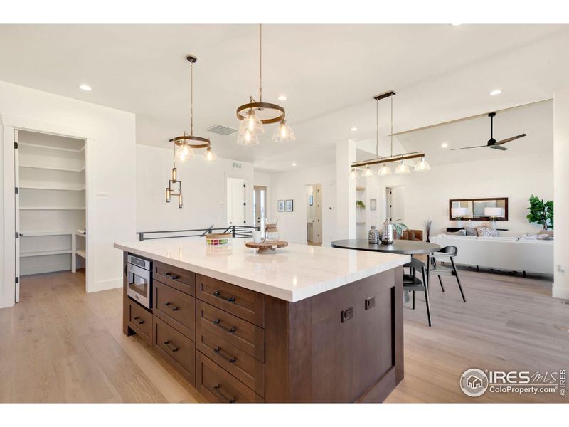 Large Kitchen Island with Lots of Storage and Built-In Microwave.