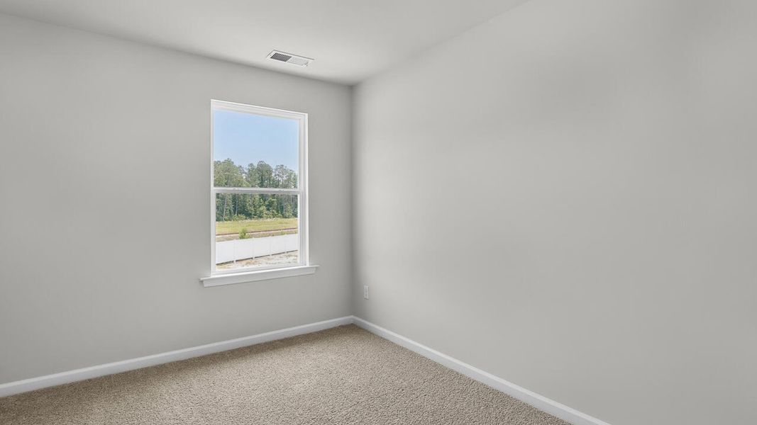 Spacious, unfurnished interior of a new home in Townes at Seabrooke, Leland (Image 23).