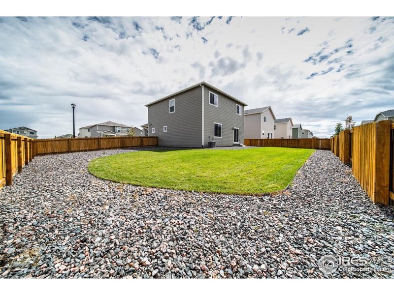 Front exterior of a new home in Hidden Creek, Frederick, CO, highlighting curb appeal (Image 14).