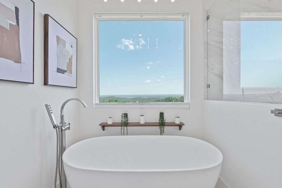 Soak with a view, freestanding tub, soft light, and peaceful Lake Travis Hill Country scenery right outside the window. Perched up high. Soak with a view, freestanding tub, soft light, and peaceful Lake Travis Hill Country scenery right outside the window. Perched up high.
