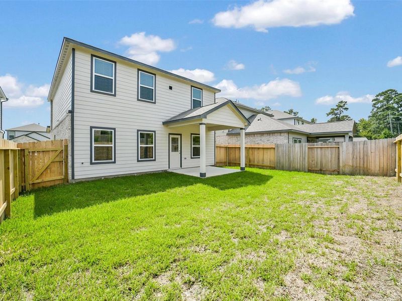 Exterior details and patio area of a home in Lakes at Black Oak, Magnolia (Image 24). Exterior details and patio area of a home in Lakes at Black Oak, Magnolia (Image 24).