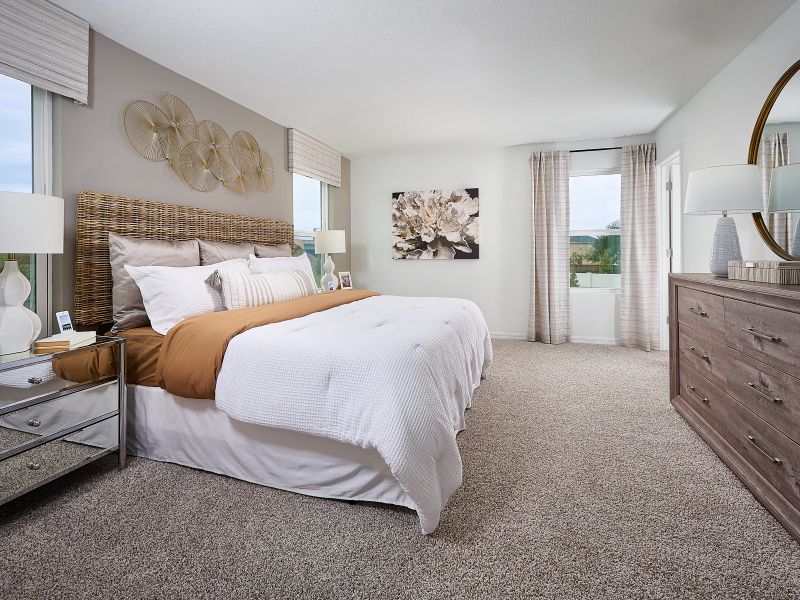 Primary bedroom in the Oakville floorplan modeled at Chase Landing.