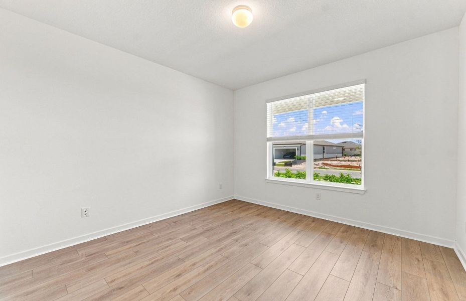 Spacious, unfurnished interior of a new home in Vida's Way, Wesley Chapel (Image 16).