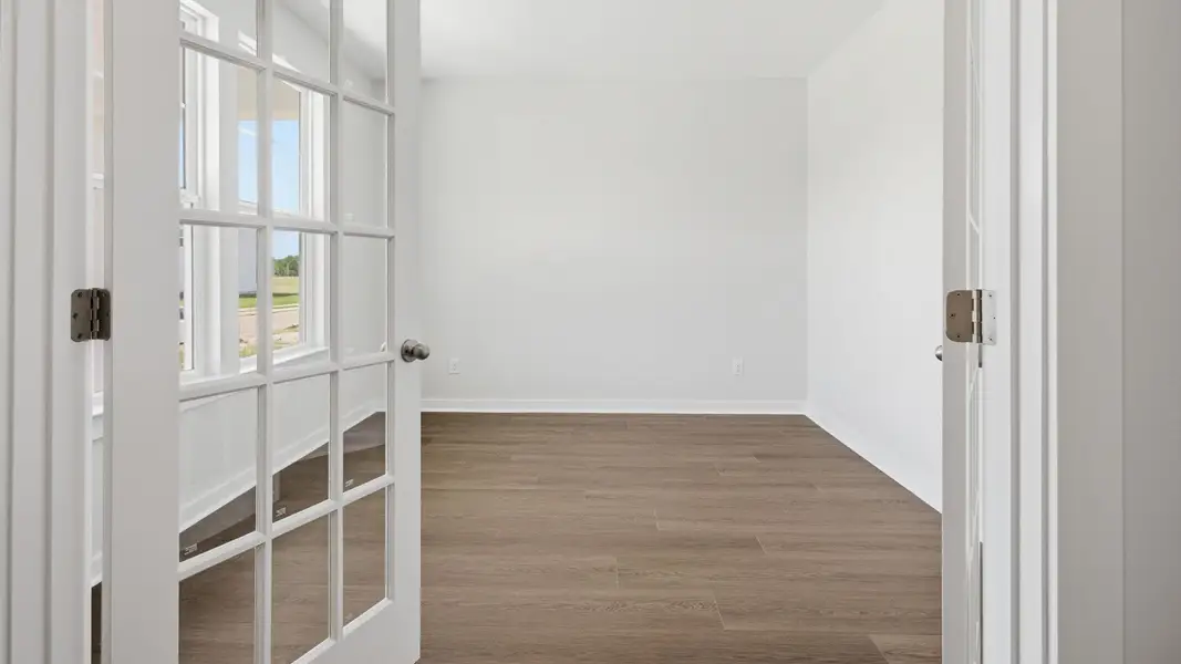The study with French doors, natural bright light from windows The study with French doors, natural bright light from windows