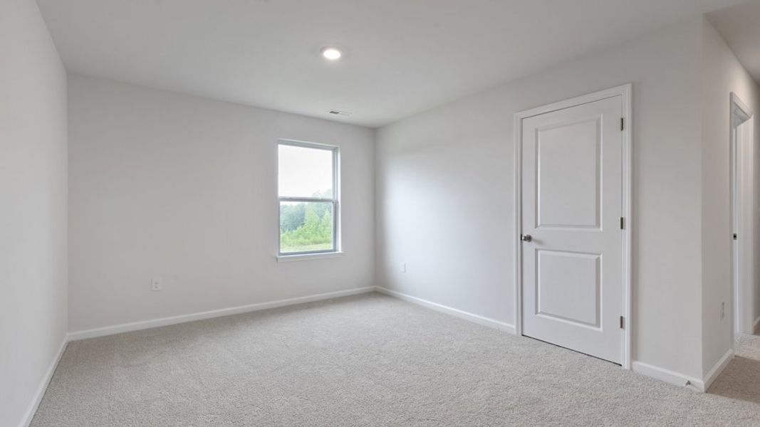 Spacious, unfurnished interior of a new home in Villa Grande, Winterville (Image 30).