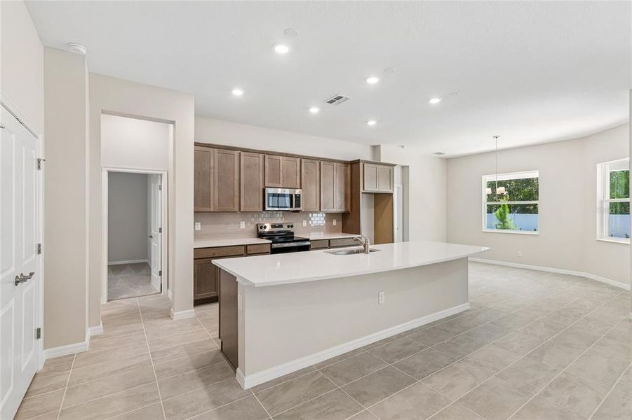 Furnished interior view inside a new home in Pinecone Reserve, Brooksville (Image 7). Furnished interior view inside a new home in Pinecone Reserve, Brooksville (Image 7).