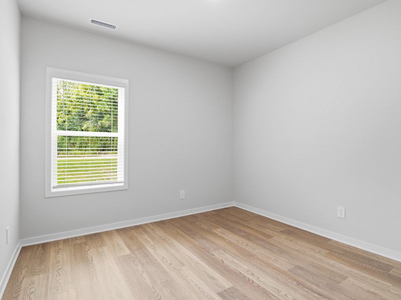 Spacious, unfurnished interior of a new home in Marshburn Landing - Signature Series, Wendell (Image 13).