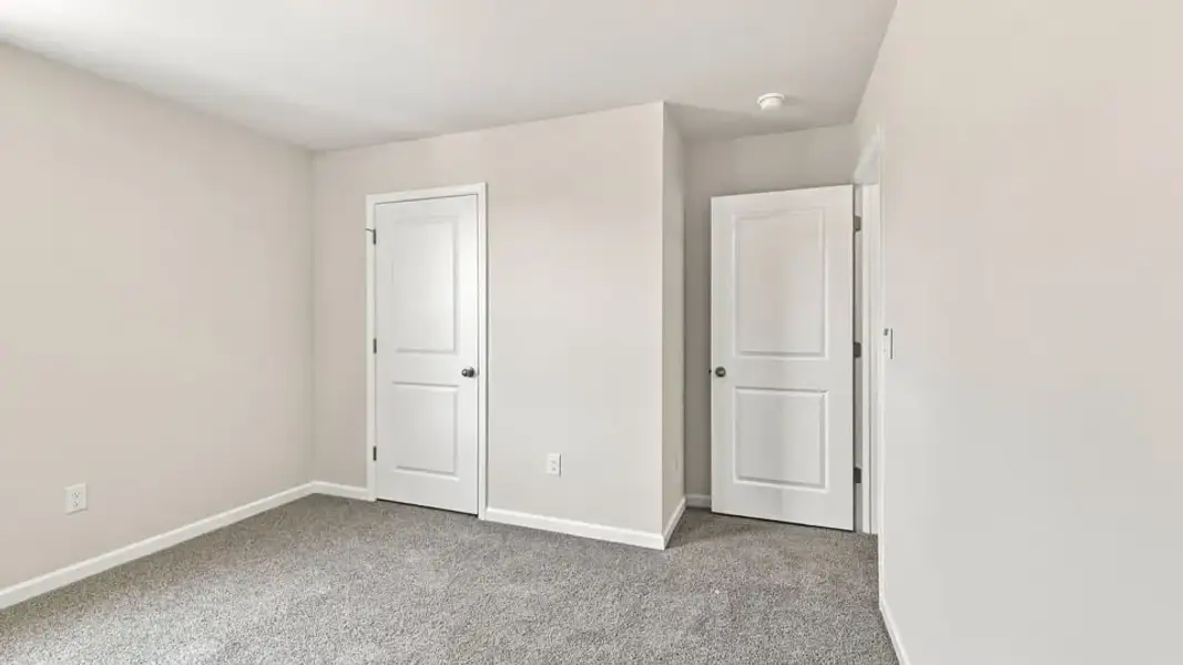 Spacious, unfurnished interior of a new home in Rocky River Ridge, Anderson (Image 32).