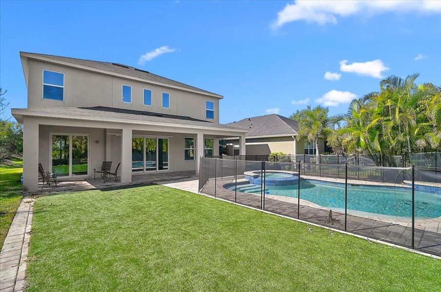 Exterior details and patio area of a home in , Sarasota (Image 26).