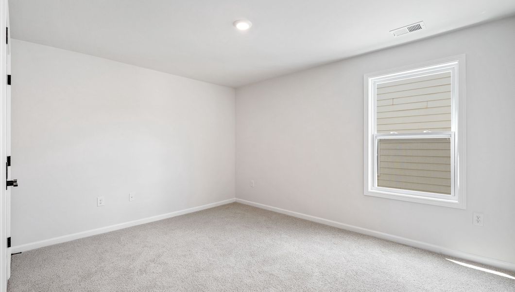 Representative unfurnished interior of a home built from the SUMMIT by D.R. Horton in Whitehawk Meadows, Travelers Rest (Image 22).