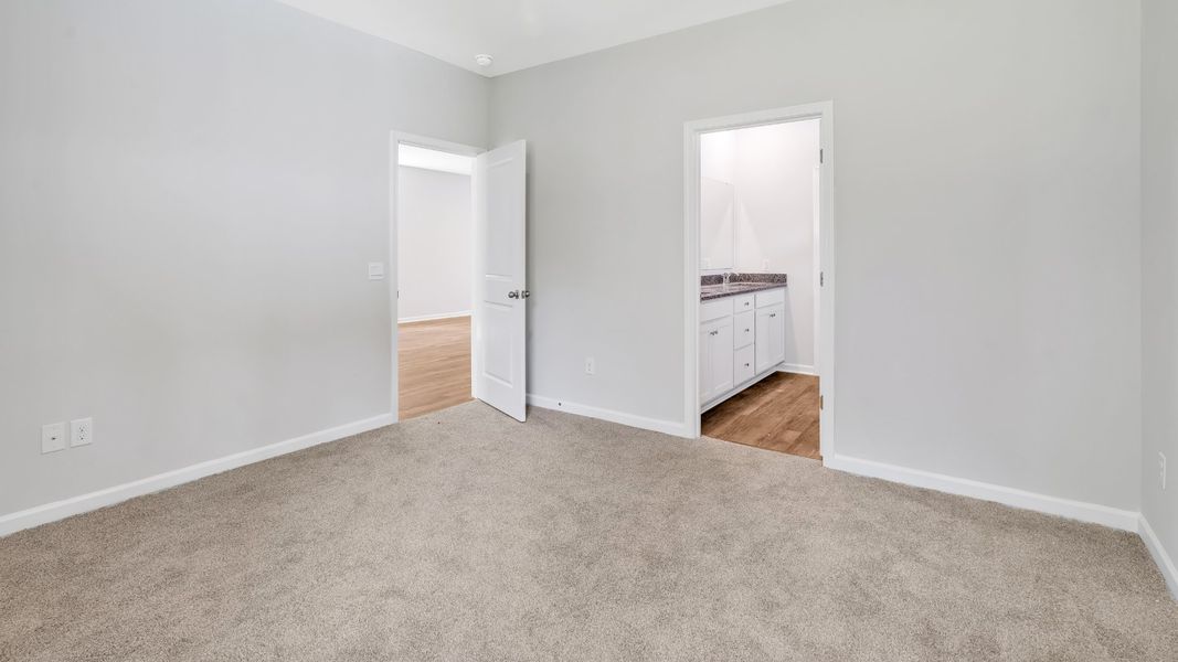 Spacious, unfurnished interior of a new home in The Pines at Blake Farm, Wilmington (Image 21).