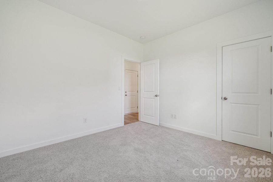 Spacious, unfurnished interior of a new home in Meadow Creek Village, Locust (Image 21).