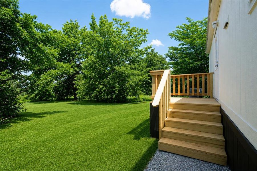Exterior details and patio area of a home in , Runaway Bay (Image 21).