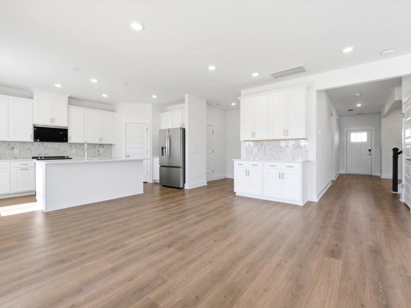 Spacious, unfurnished interior of a new home in The Coves at Lakes of Cane Bay II, Summerville (Image 21). Spacious, unfurnished interior of a new home in The Coves at Lakes of Cane Bay II, Summerville (Image 21).