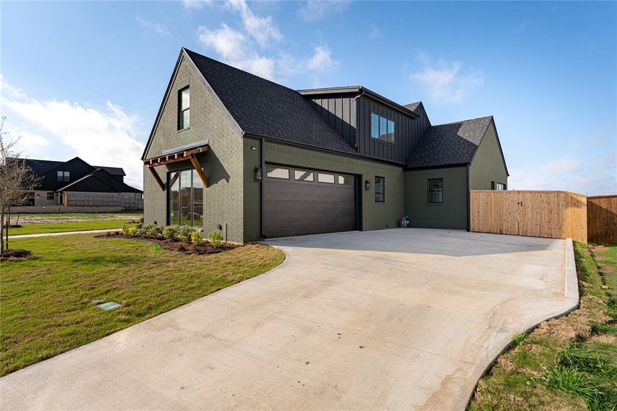 Front exterior of a new home in , Woodway, TX, highlighting curb appeal (Image 26).