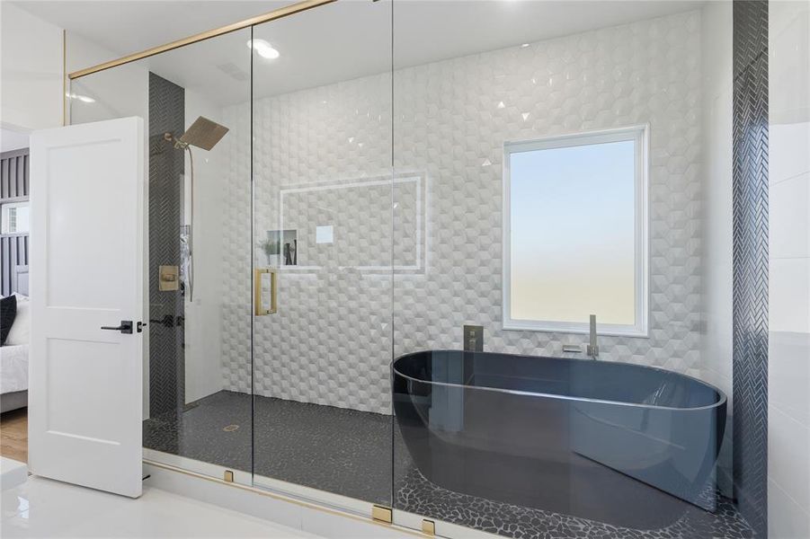 Ensuite bathroom with a soaking tub and a shower stall