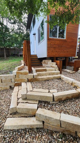 Steps off the front side area under shaded cedar elms. Steps off the front side area under shaded cedar elms.