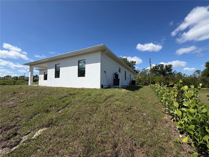 Exterior details and patio area of a home in , Naples (Image 28). Exterior details and patio area of a home in , Naples (Image 28).