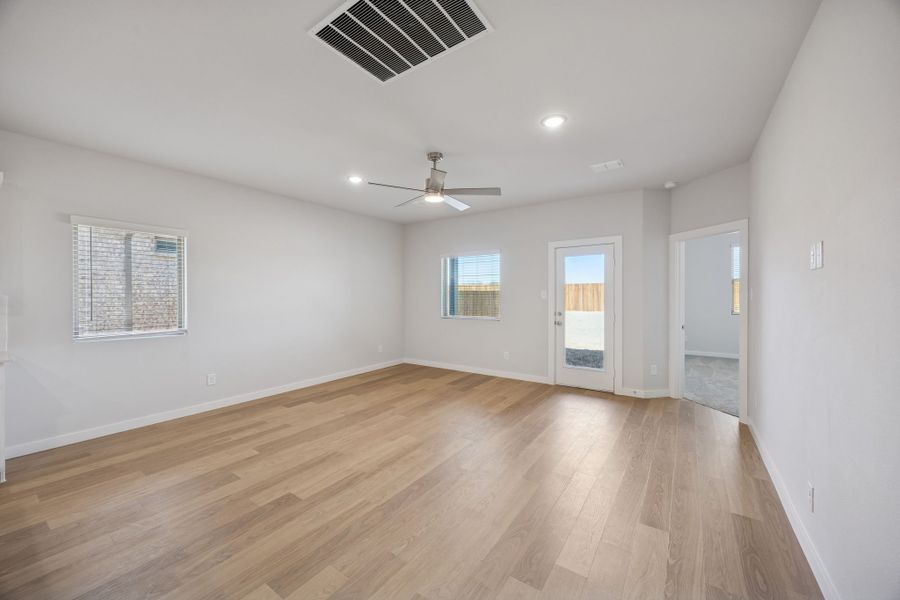 Living Room in the Oak II home plan by Trophy Signature Homes – REPRESENTATIVE PHOTO