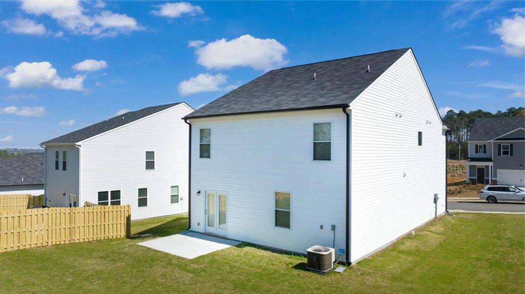Front exterior of a new home in Shoal Creek, Hampton, GA, highlighting curb appeal (Image 11).
