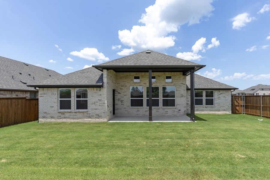 Exterior details and patio area of a home in River Ranch, Van Alstyne (Image 4). Exterior details and patio area of a home in River Ranch, Van Alstyne (Image 4).