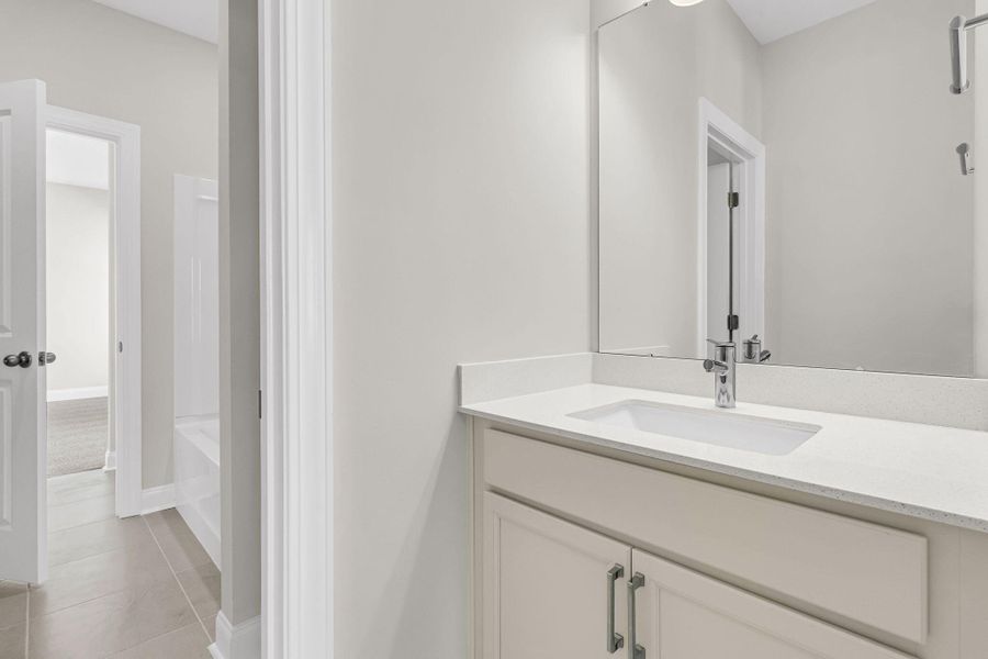 Furnished interior view inside a new home in Tidewater at Lakes of Cane Bay, Summerville (Image 14). Furnished interior view inside a new home in Tidewater at Lakes of Cane Bay, Summerville (Image 14).