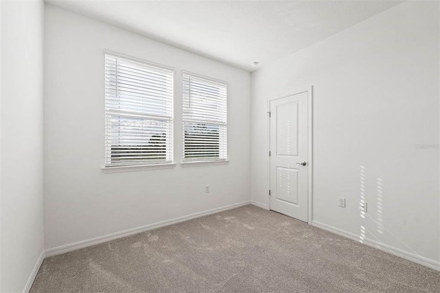 Spacious, unfurnished interior of a new home in Brack Ranch, St. Cloud (Image 19).