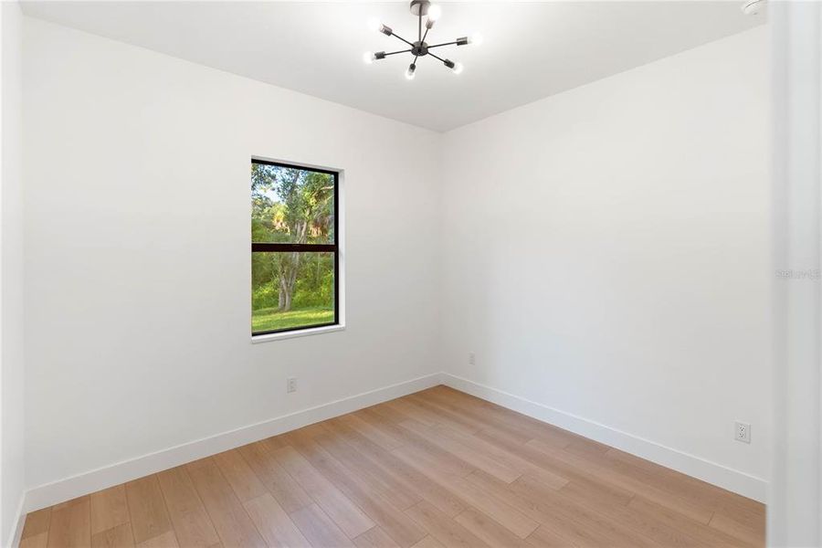 Spacious, unfurnished interior of a new home in , Port Charlotte (Image 19).