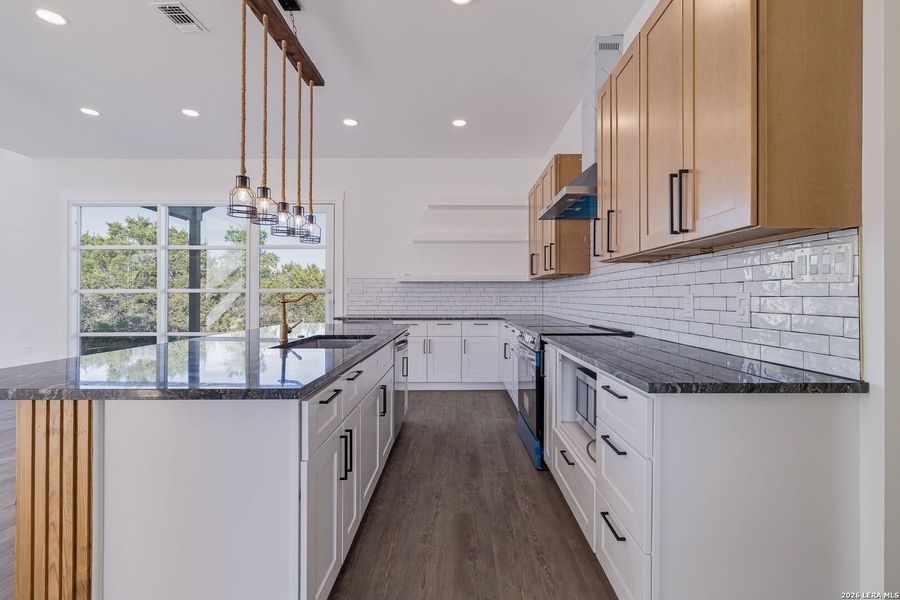 Furnished interior view inside a new home in , Fischer (Image 13).