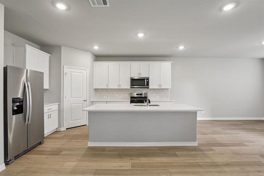 Furnished interior view inside a new home in Parks at Foster Crossing - Premier Series, Anna (Image 6). Furnished interior view inside a new home in Parks at Foster Crossing - Premier Series, Anna (Image 6).