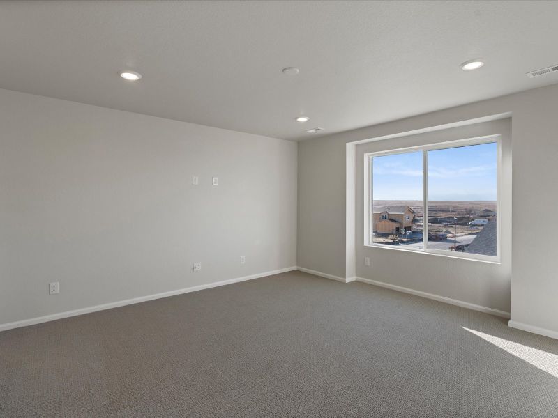 Spacious, unfurnished interior of a new home in Buffalo Highlands: The Canyon Collection, Commerce City (Image 7).