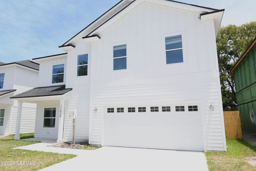 Front exterior of a new home in , Jacksonville, FL, highlighting curb appeal (Image 2). Front exterior of a new home in , Jacksonville, FL, highlighting curb appeal (Image 2).
