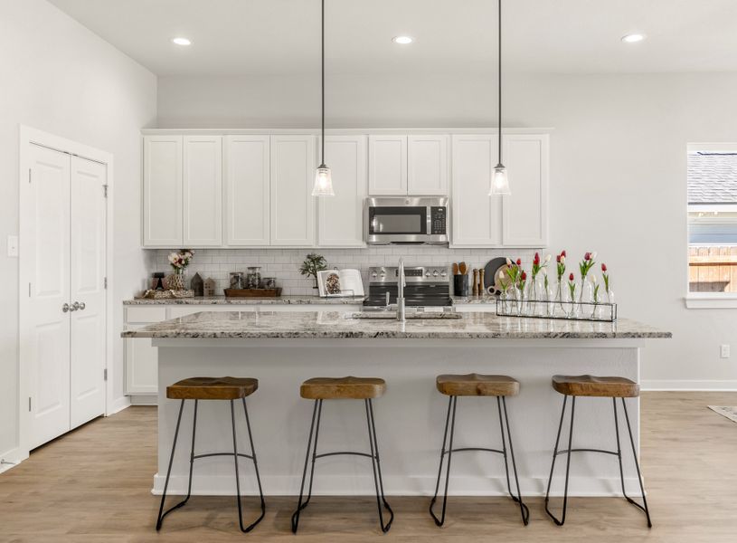 Representative furnished interior of a home built from the The Azalea by Avonley Homes in Pinemont, Bryan (Image 5).