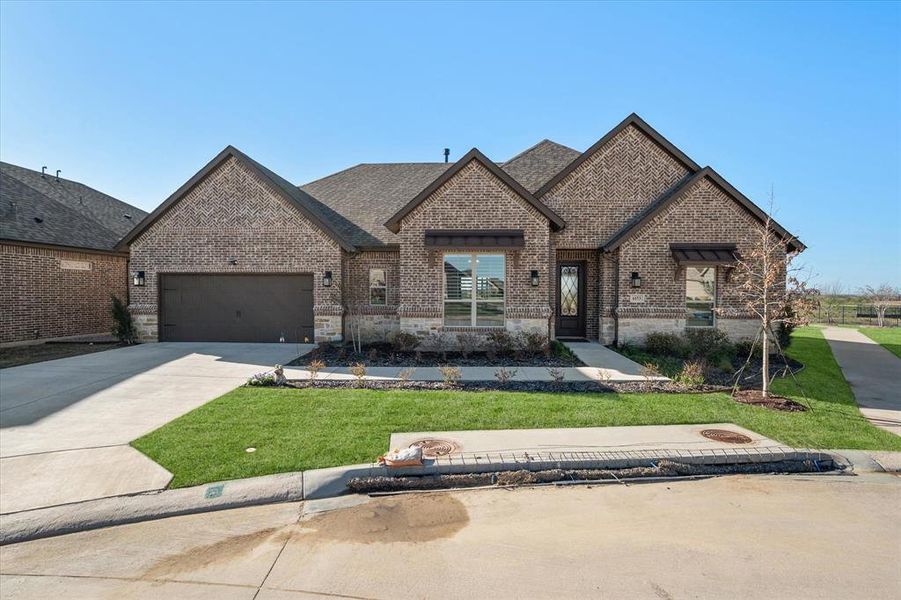 Front exterior of a new home in , Fort Worth, TX, highlighting curb appeal (Image 1). Front exterior of a new home in , Fort Worth, TX, highlighting curb appeal (Image 1).