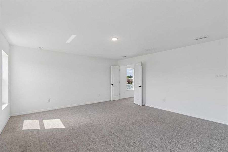 Spacious, unfurnished interior of a new home in Avalon West, Spring Hill (Image 56).