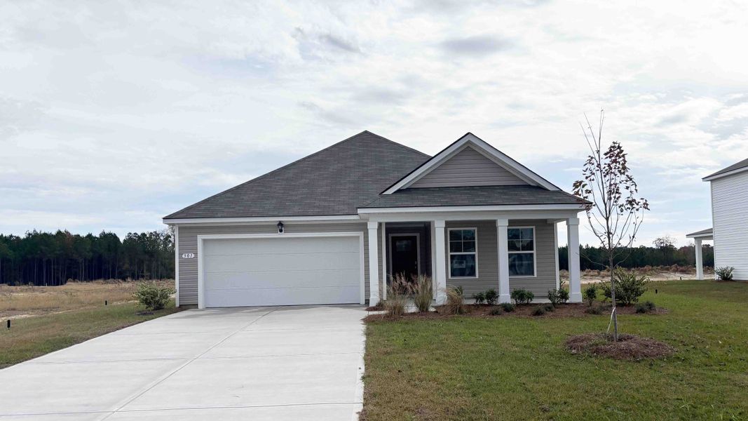 Front exterior of a home in the Ivy Woods community, located in Longs, SC (Image 7). Front exterior of a home in the Ivy Woods community, located in Longs, SC (Image 7).