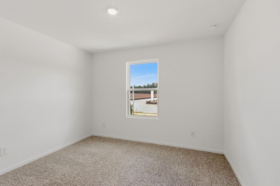 Spacious, unfurnished interior of a new home in New Waverly Station, New Waverly (Image 16). Spacious, unfurnished interior of a new home in New Waverly Station, New Waverly (Image 16).