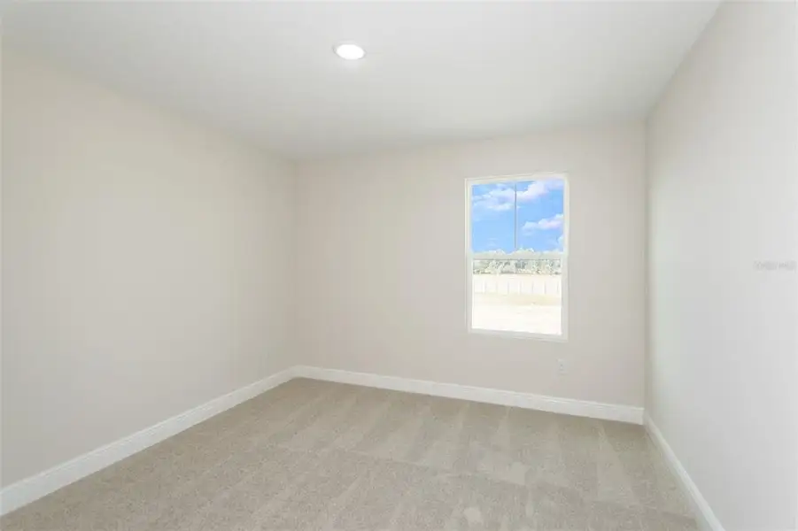 Spacious, unfurnished interior of a new home in Pasadena Woods, Dade City (Image 20).