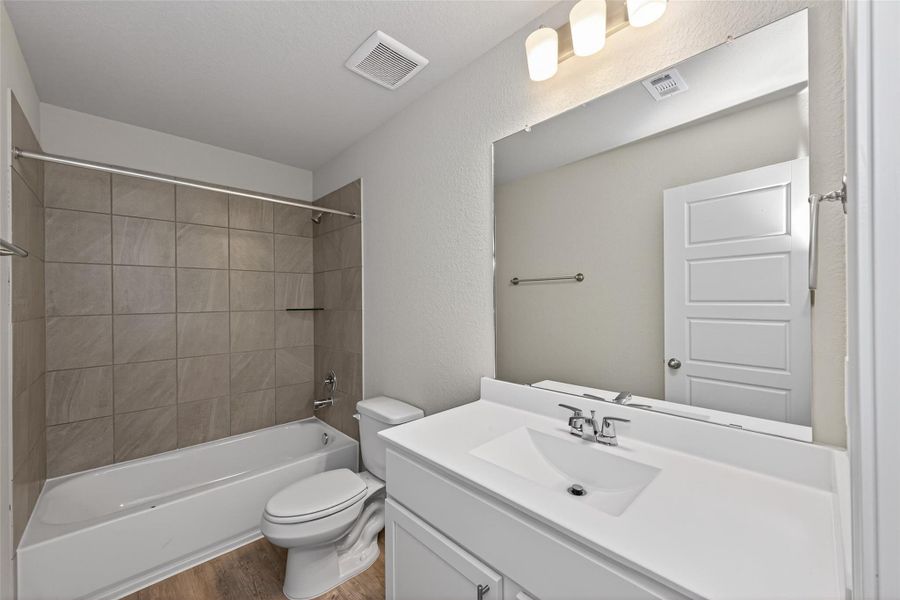 Furnished interior view inside a new home in Woodland Lakes, Houston (Image 13).