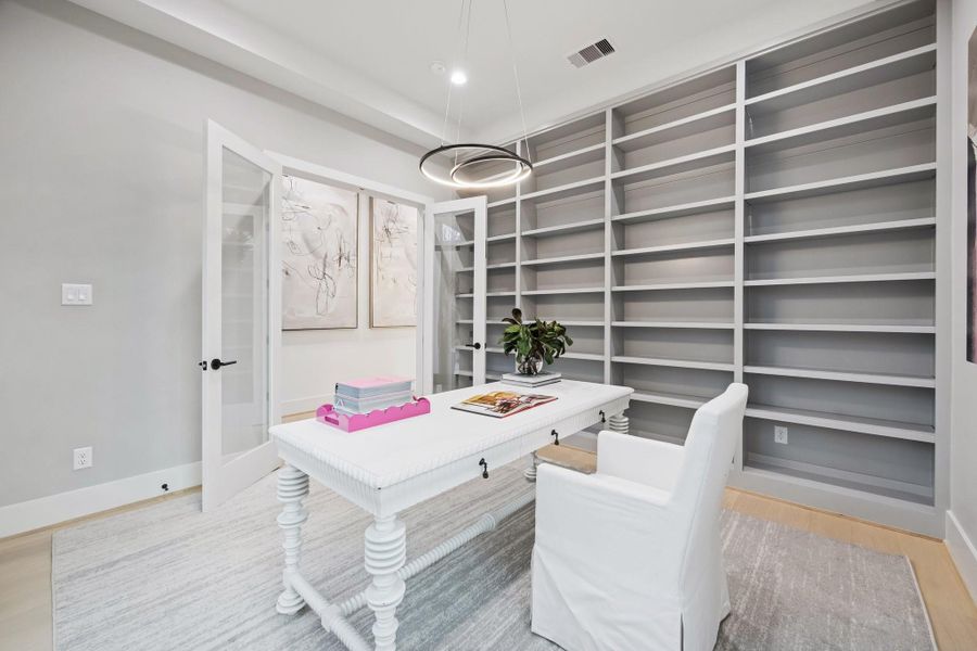Another view of the study which also features and set of french doors with clear glass.
