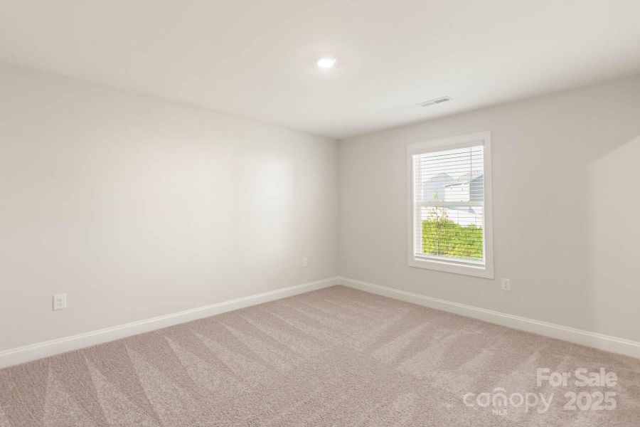 Spacious, unfurnished interior of a new home in Colonial Crossing, Troutman (Image 17).