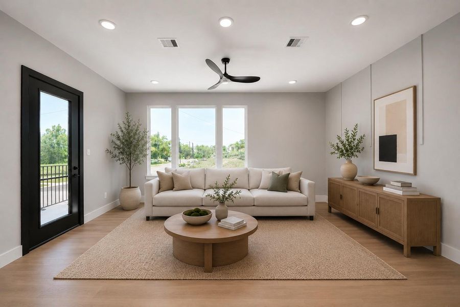 Bright & inviting living space featuring modern finishes, oversized windows, & warm contemporary design with direct balcony access.