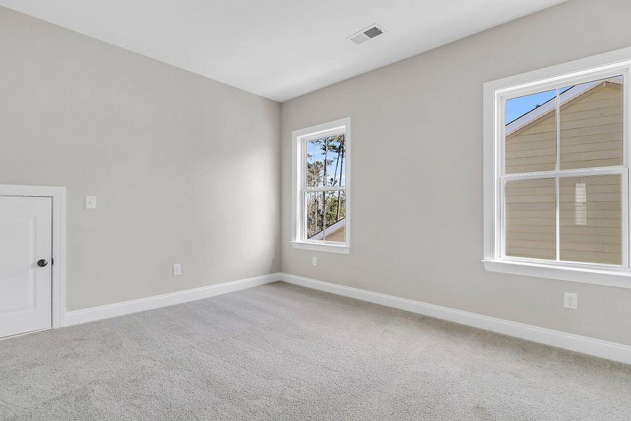 Spacious, unfurnished interior of a new home in Tidewater at Lakes of Cane Bay, Summerville (Image 21). Spacious, unfurnished interior of a new home in Tidewater at Lakes of Cane Bay, Summerville (Image 21).