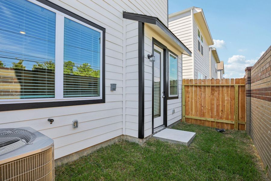 Exterior details and patio area of a home in Spring Brook Village - City Series, Houston (Image 3).