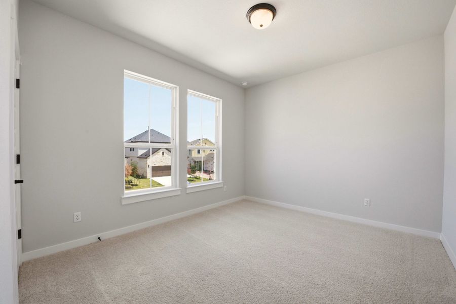 Spacious, unfurnished interior of a new home in Heritage, Dripping Springs (Image 34).