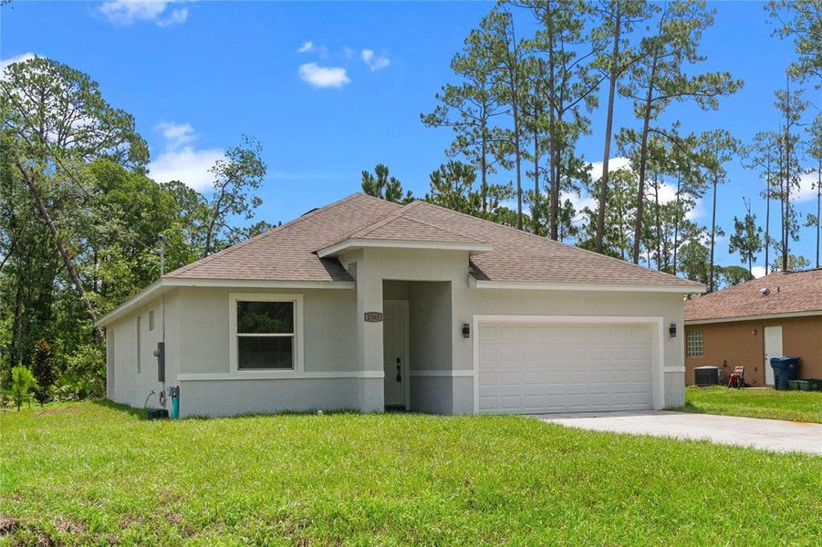 Front exterior of a new home in , Deland, FL, highlighting curb appeal (Image 2).