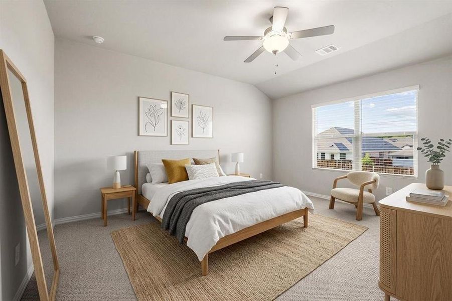The primary bedroom overlooks the backyard (virtually staged).
