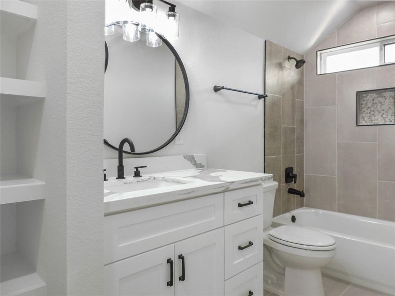 Other interior pictures of a secondary bathroom built by Texas best home builders
