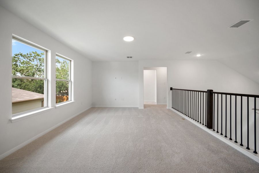 Spacious, unfurnished interior of a new home in The Hills of Bear Creek, Manchaca (Image 16).